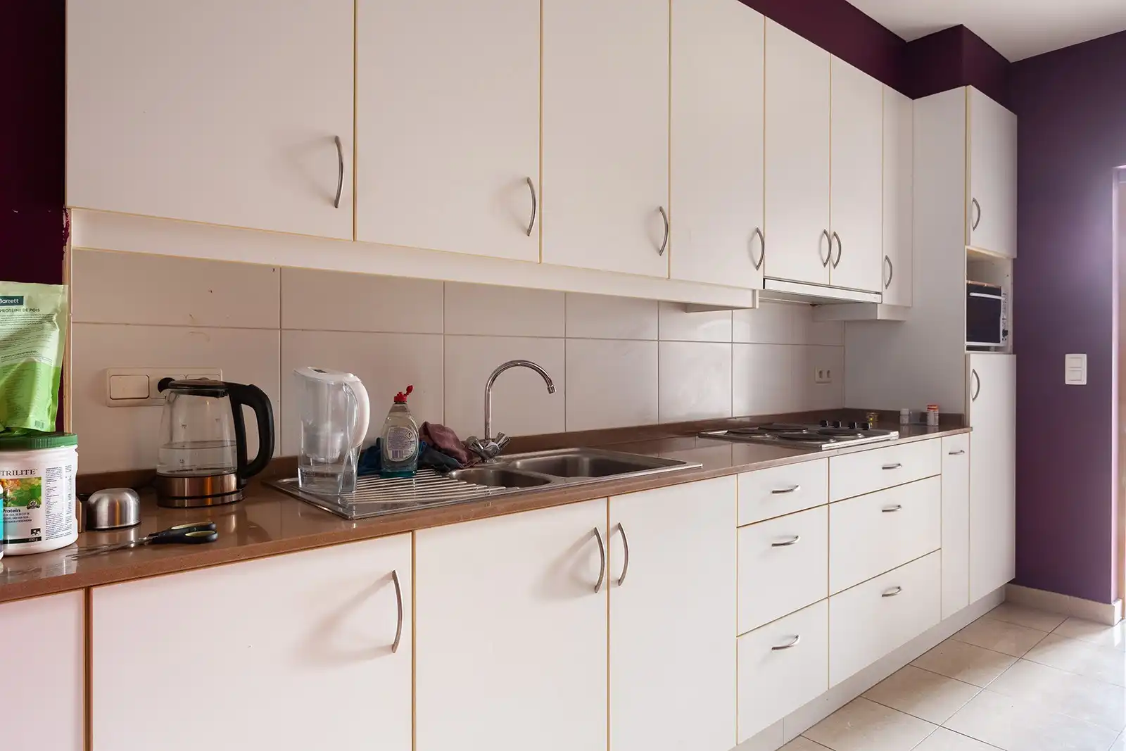 Opbrengsteigendom met 6 appartementen en 9 garageboxen foto 11