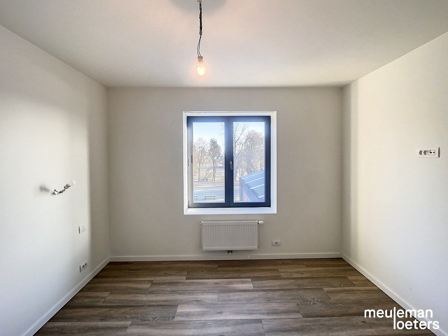 Lichtrijk appartement met terras en autostaanplaats foto 10