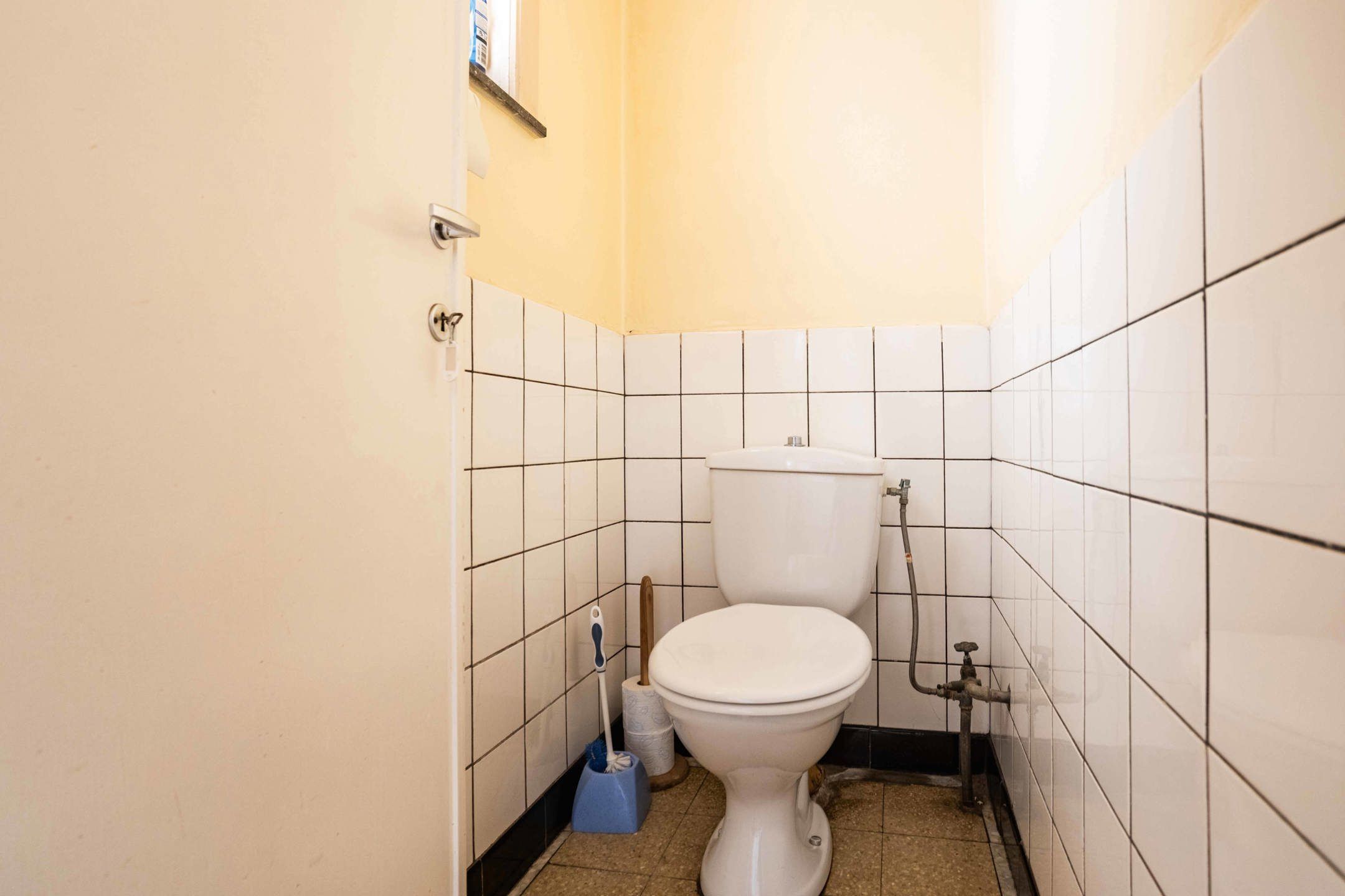 Te renoveren solide woning met garage op uitstekende locatie foto 14