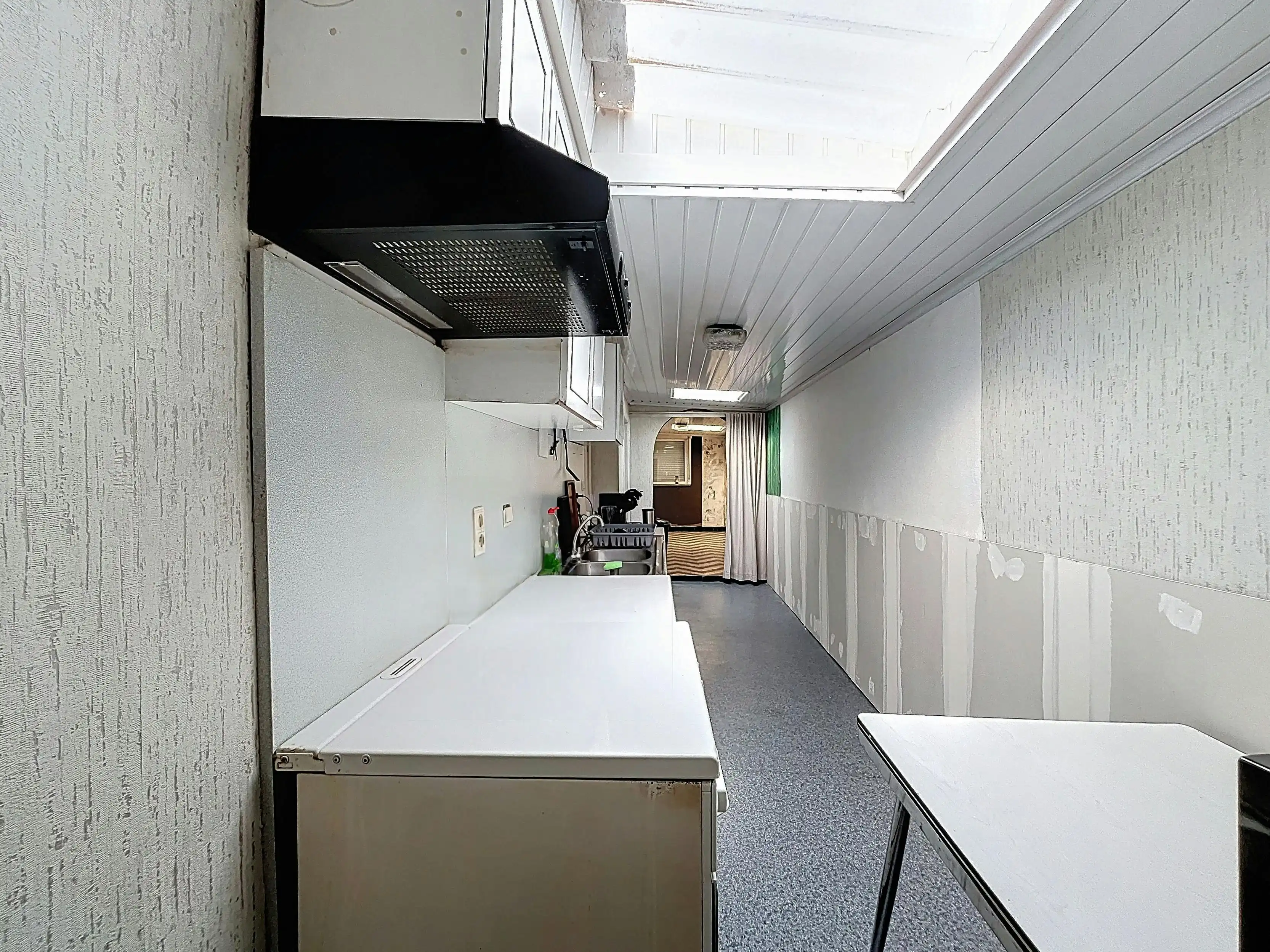 Te renoveren woning in het centrum van Ursel foto 6