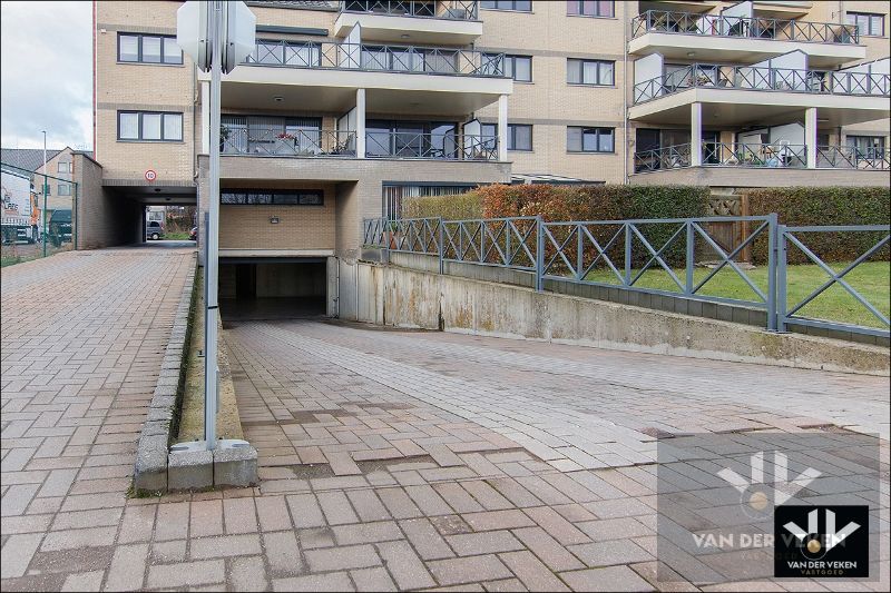 Zeer ruim, lichtrijk en instapklaar gelijkvloers appartement met tuin en gedeeltelijk overdekt terras in het centrum van Kortessem foto 12