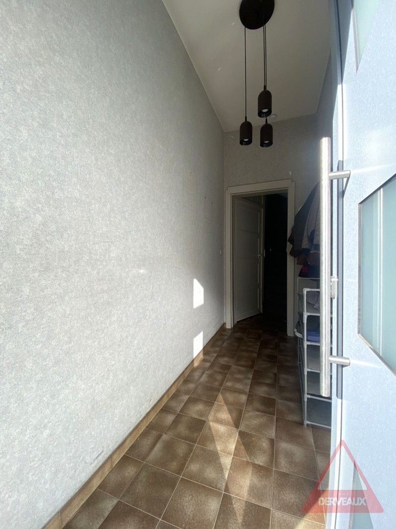 Zonnebeke - Woning met diepe tuin en dubbele garage in het centrum foto 2