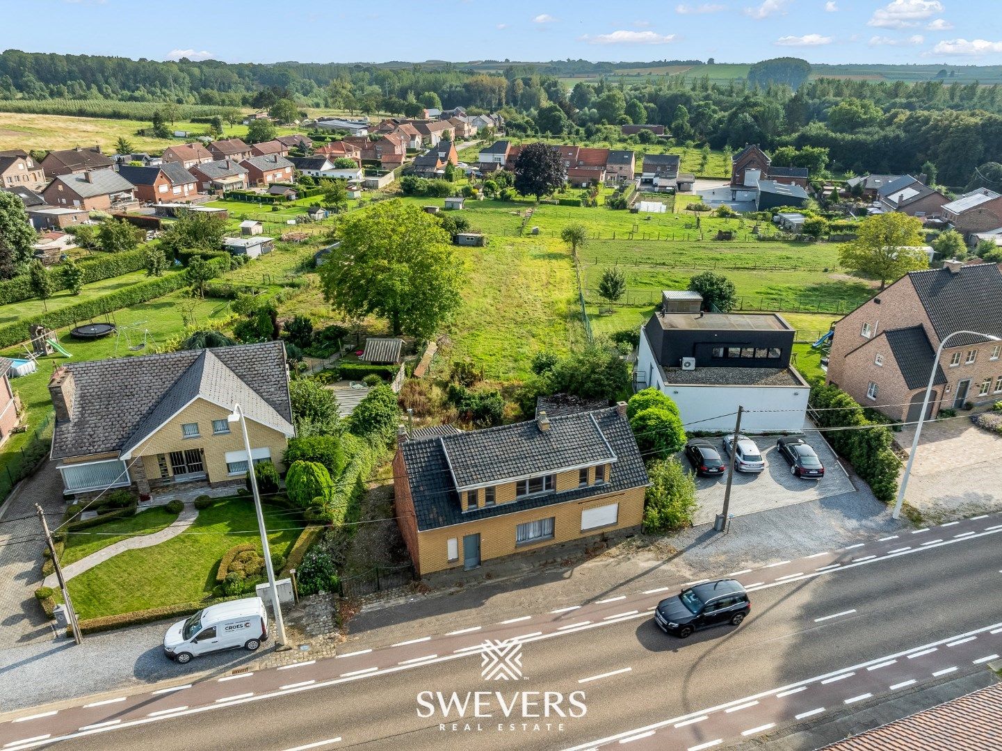 Ruim bouwperceel met te slopen woning in Borgloon foto 3