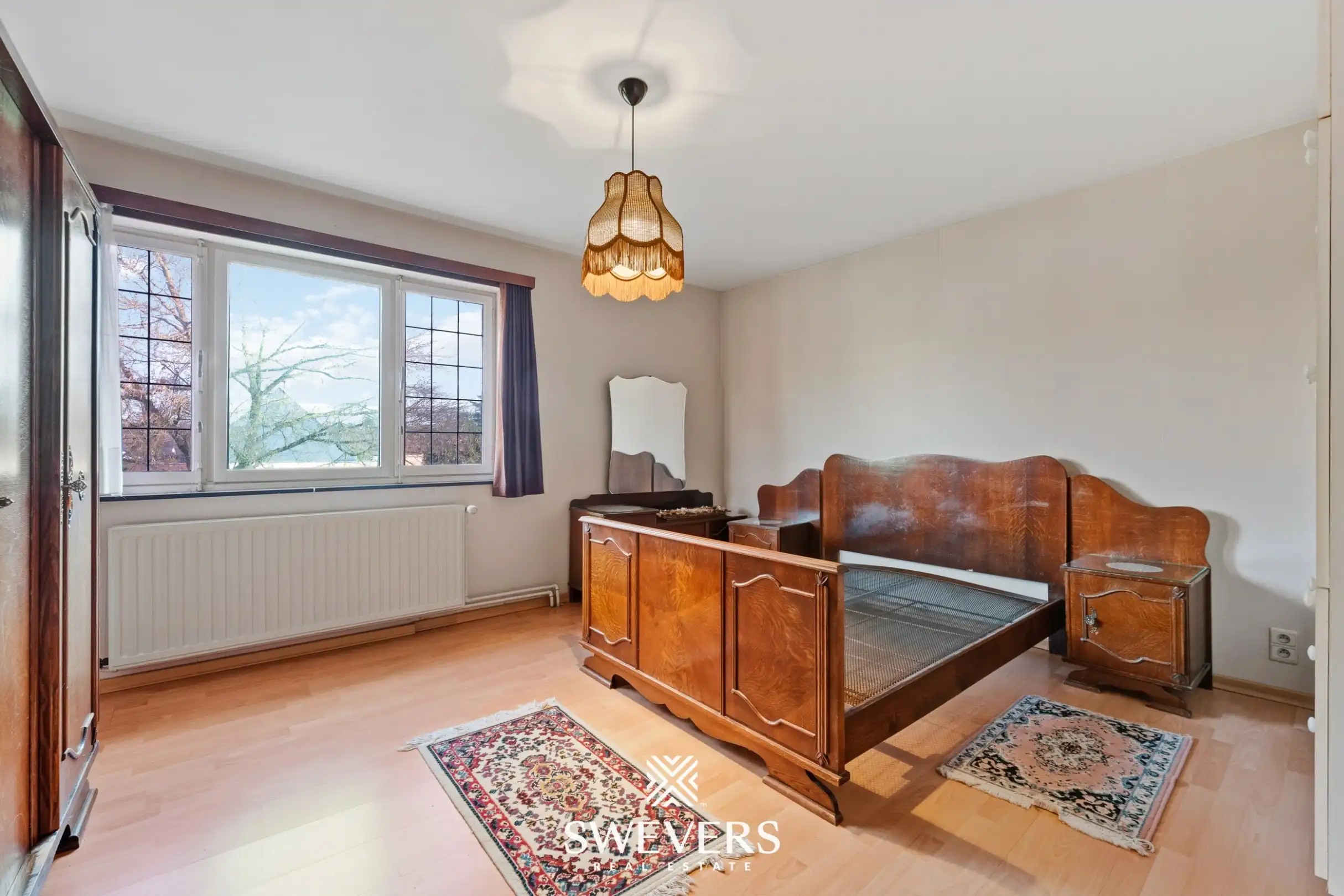 Vrijstaande woning met drie slaapkamers, bureauruimte en tuin in Houthalen foto 14