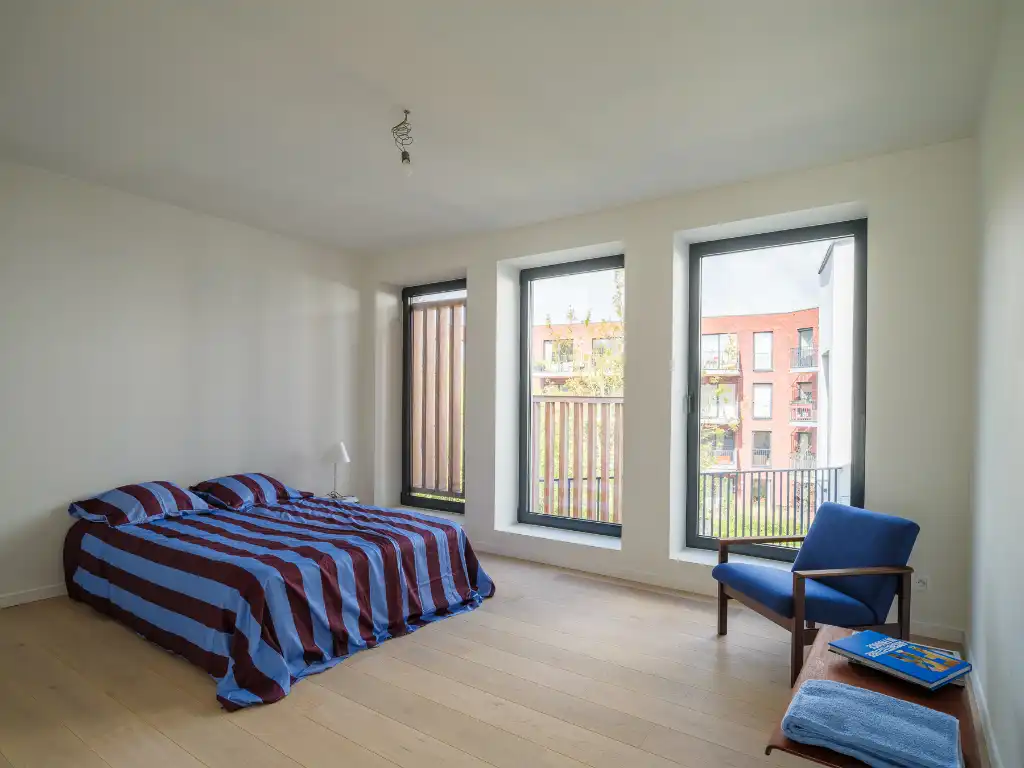 Uniek townhouse-appartement met o.m. 4 slaapkamers, 3 badkamer en een ruim terras. foto 16