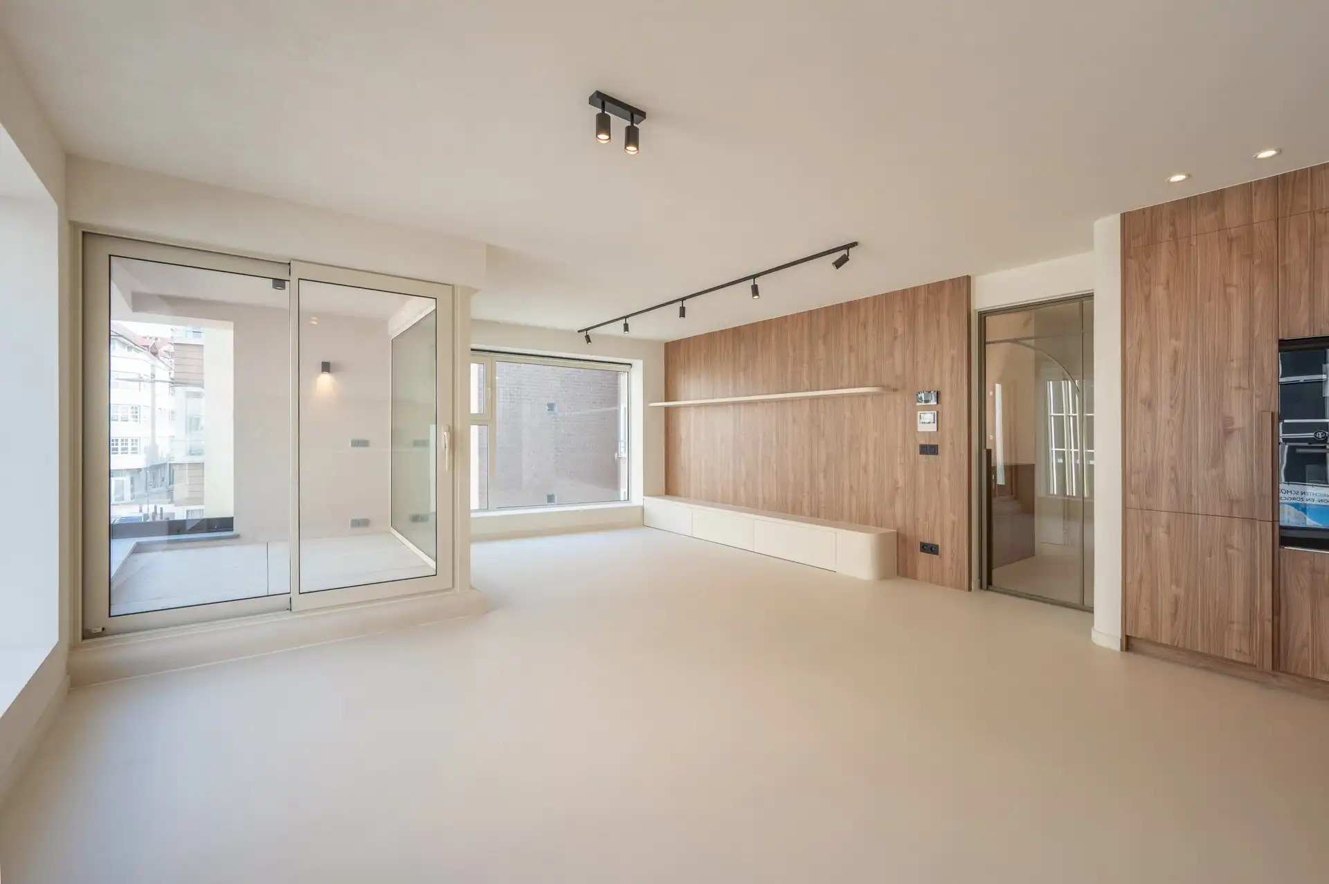 Volledig vernieuwde opbrengsteigendom met drie appartementen en verhuurd handelsgelijkvloers foto 8