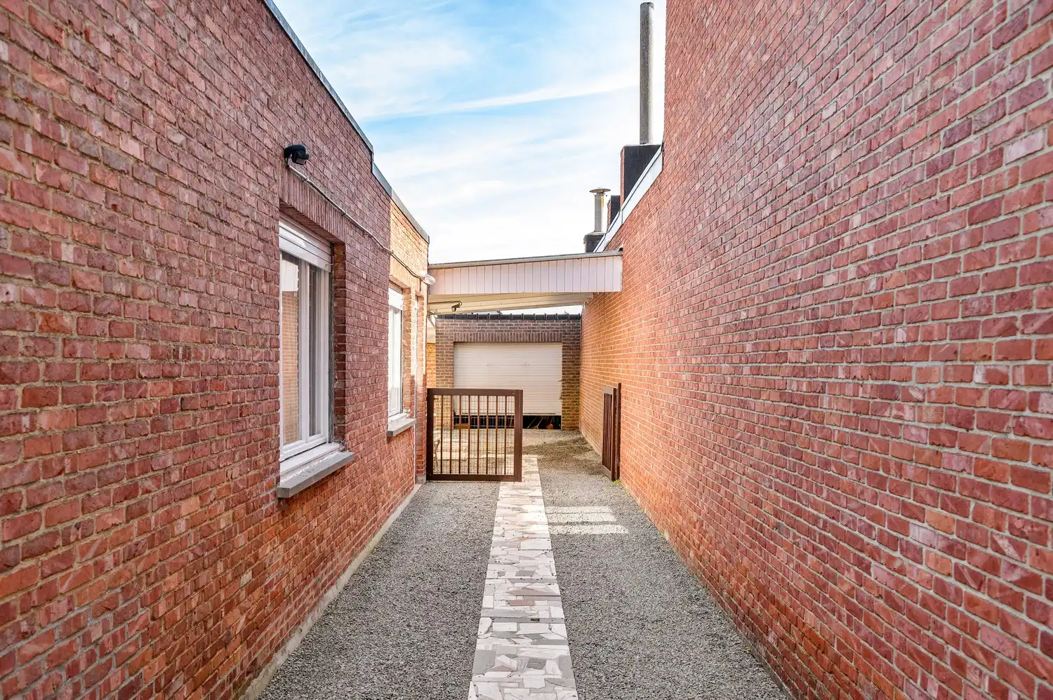 Te renoveren laagbouwwoning met garage, atelier en tuin op een perceel van 451 m². foto 28