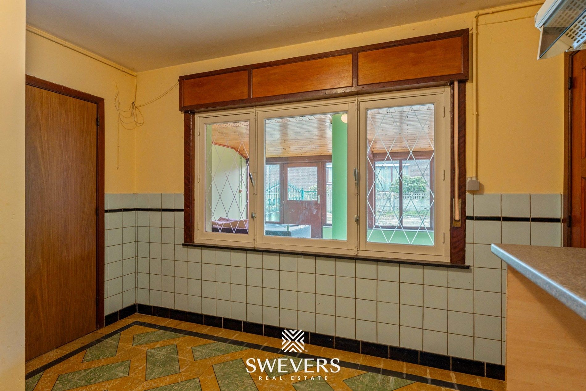 Ruime open bebouwing met potentieel en zuidgerichte tuin in rustige wijk van Houthalen foto 11