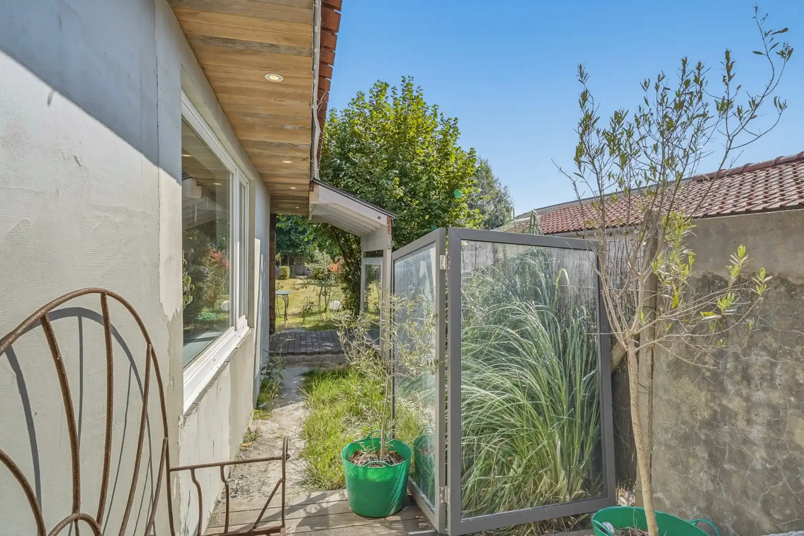 Te renoveren woning met ruime tuin in Bredene foto 6