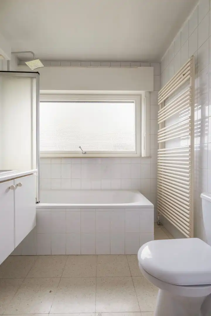 Degelijke woning met 4 slaapkamers, garage en tuin! foto 12