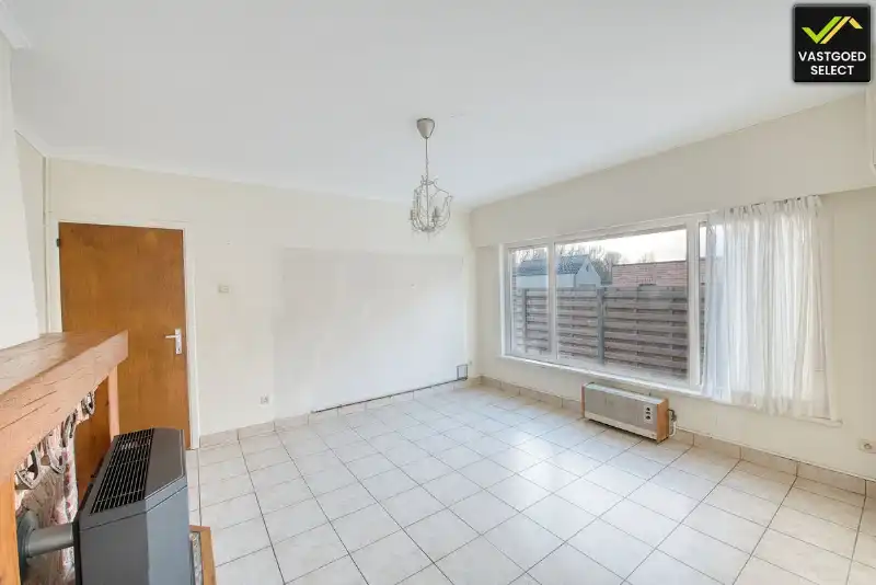 Te renoveren woning met tuin en garage in Sint-Laureins foto 4