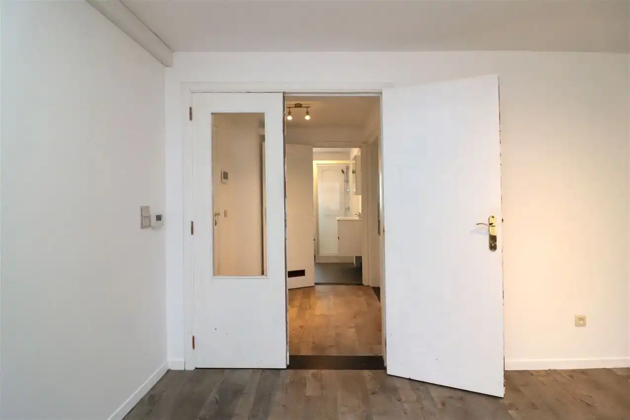 Vernieuwd app. met 1 slpk. op wandelafstand van centrum foto 12