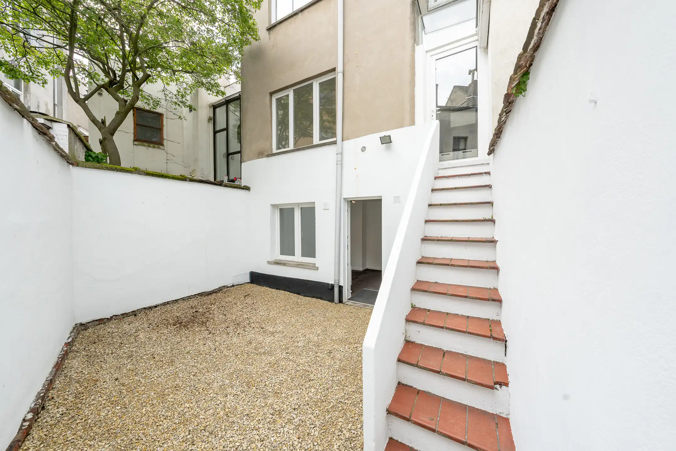 Lichtrijke duplex met tuin in Zurenborg foto 8