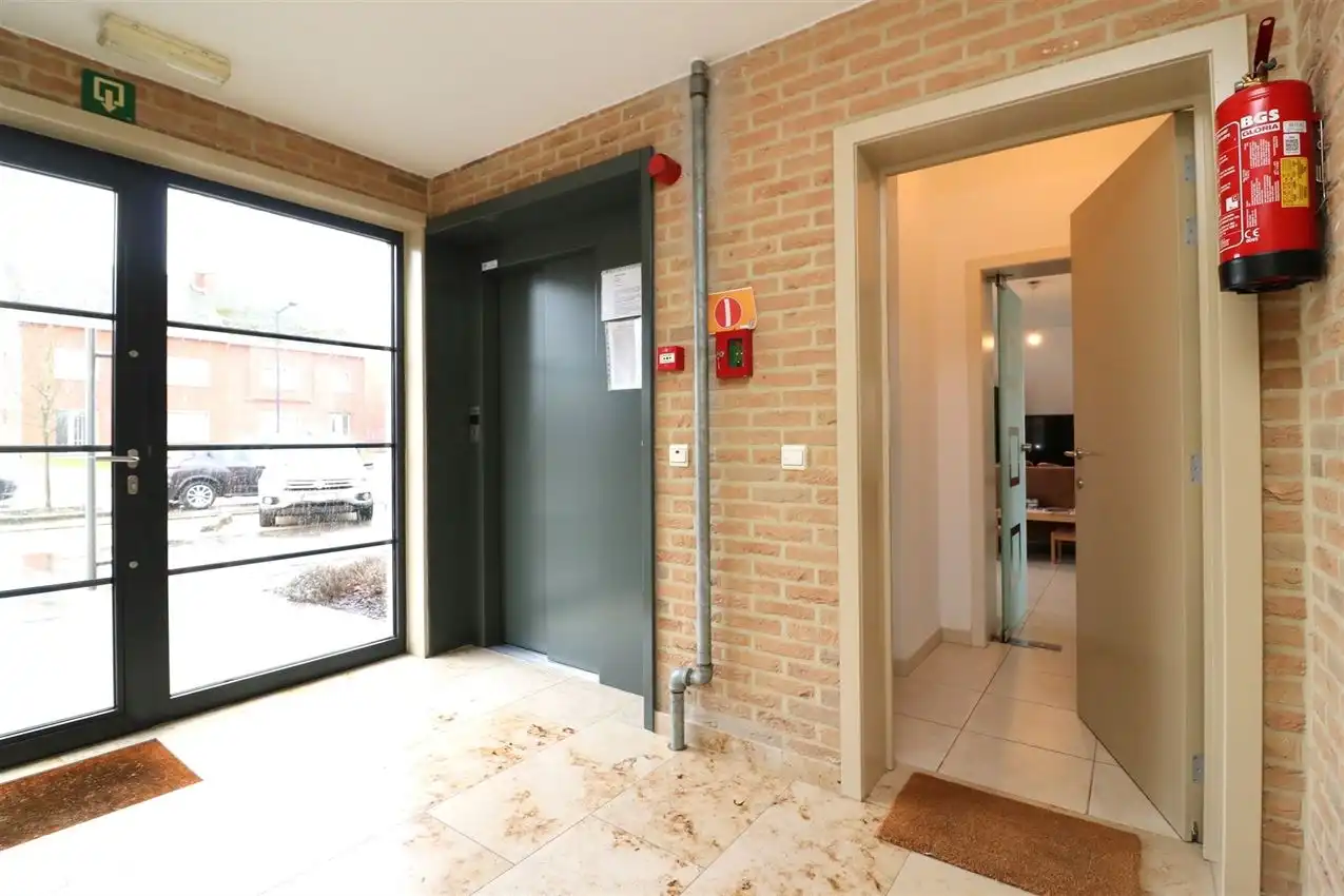 Ruim gelijkvloers wonen met tuin én rendement. foto 8
