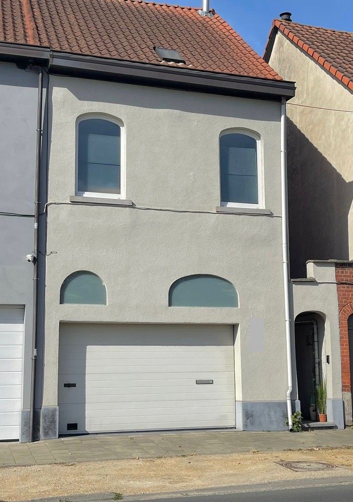 Woning met inpandige garage en tuin foto 2