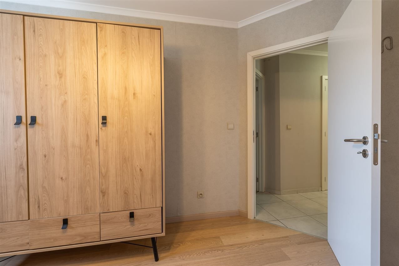 Verzorgd gebouw met handelszaak en 2 apt foto 11