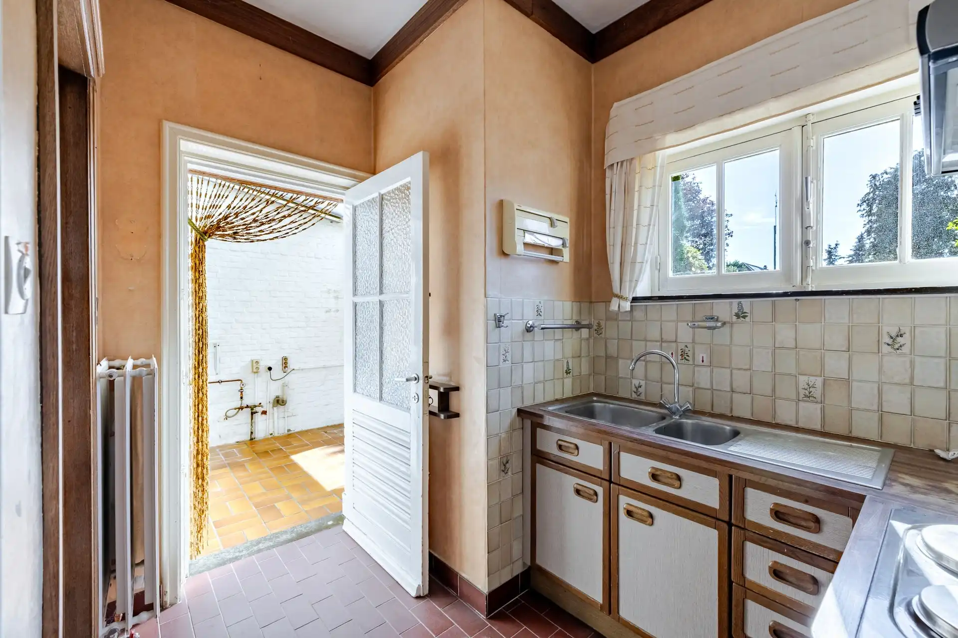 Te renoveren woning met 3 slks en zuidgerichte tuin foto 11