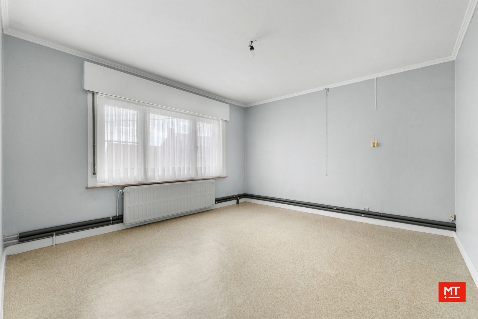 Te renoveren alleenstaande woning met 3 slaapkamers, Westgerichte tuin en garage in het centrum van Passendale foto 12