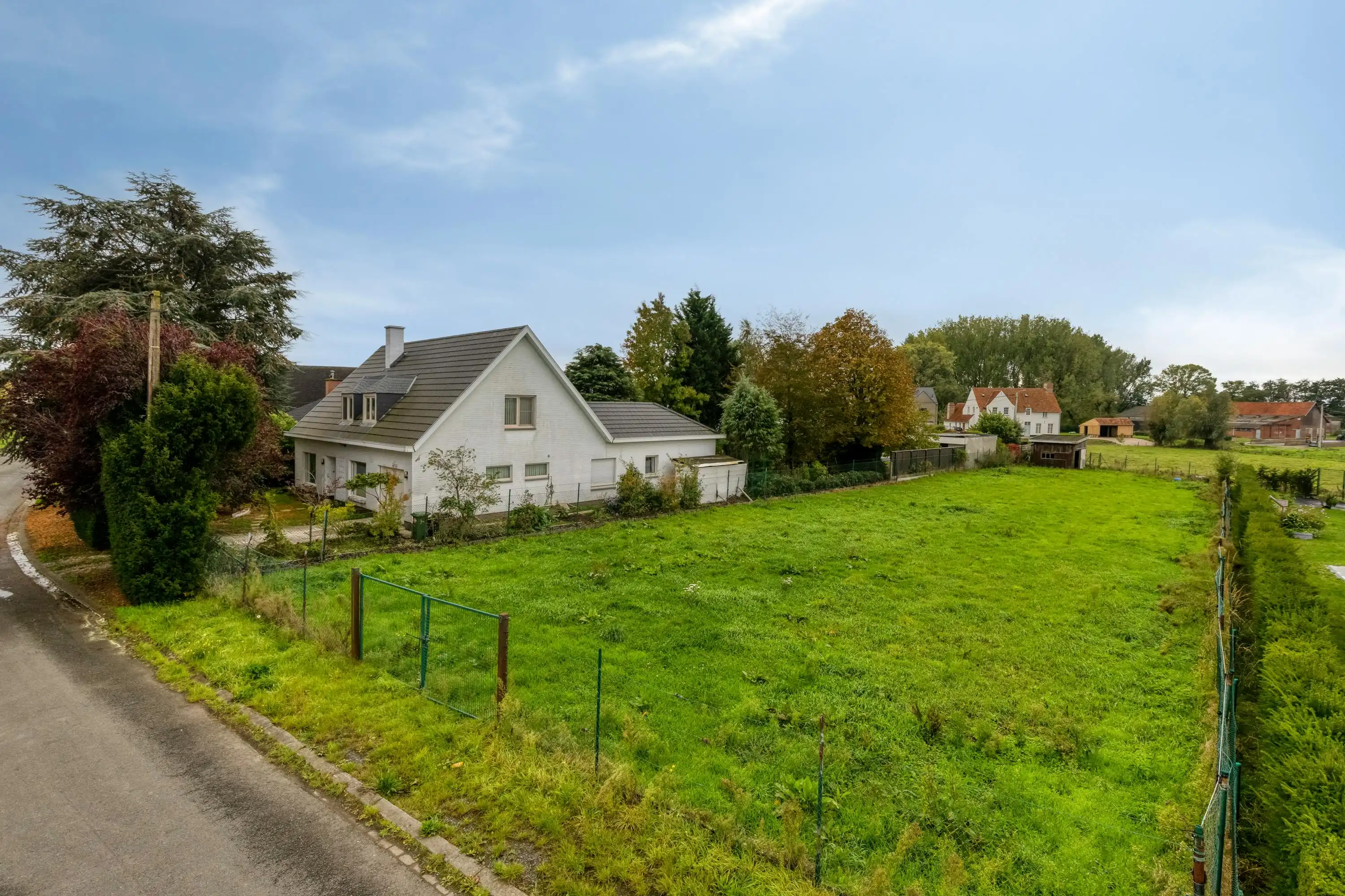 Grond voor een open bebouwing te koop in Kuurne! foto 3
