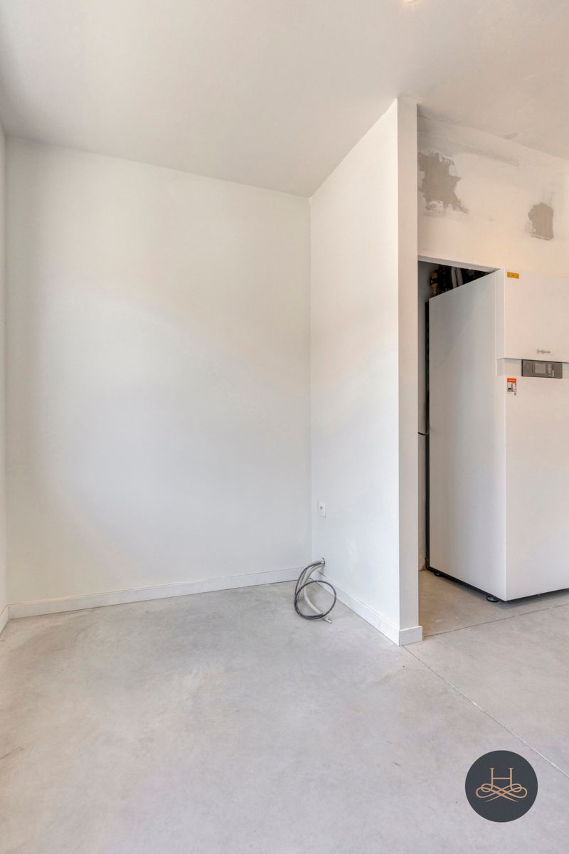 Stijlvolle, energiezuinige en gerenoveerde woning met tuin foto 13