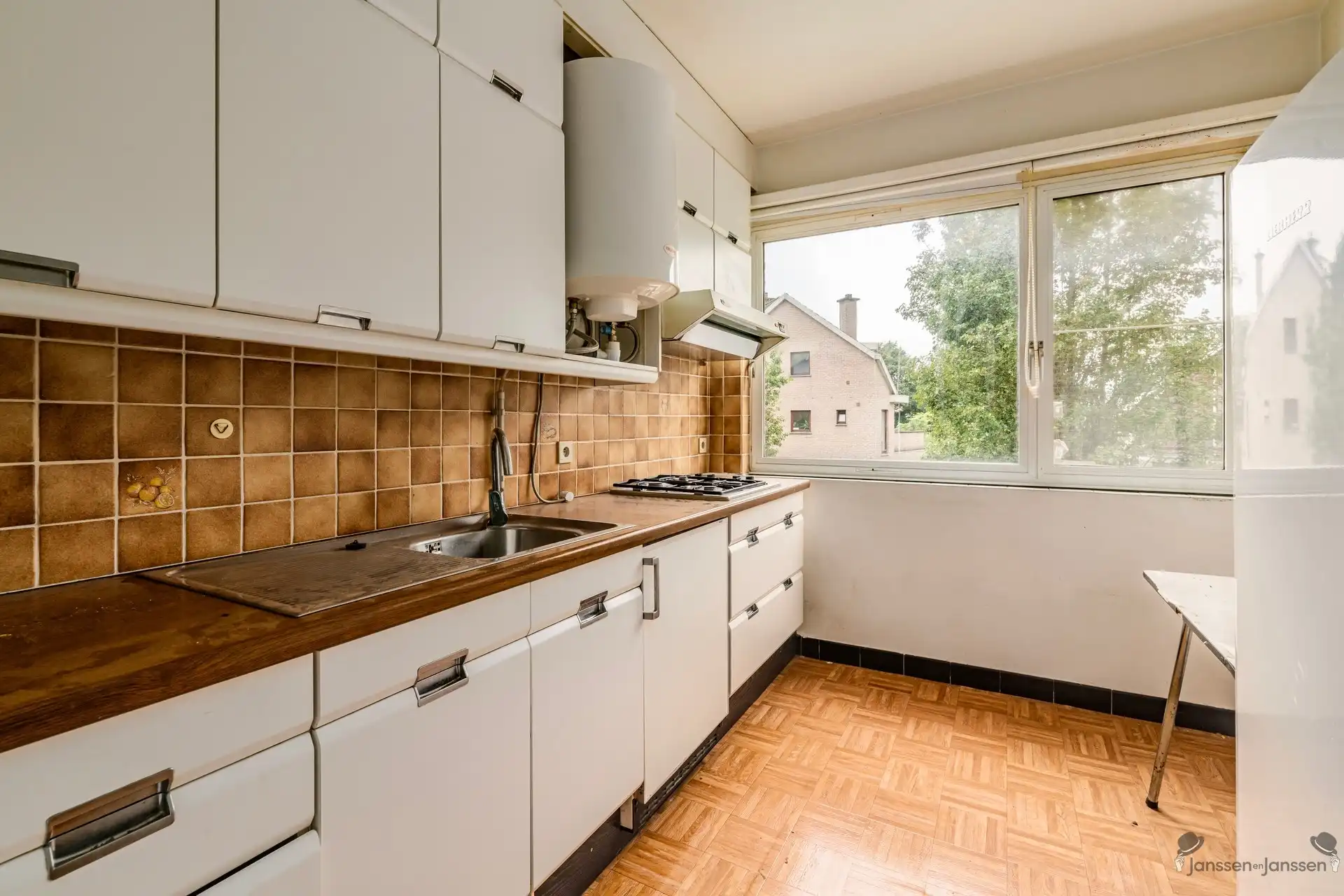 Te renoveren investeringsproject met 2 vergunde woonentiteiten en veel potentieel in Schoten! foto 13