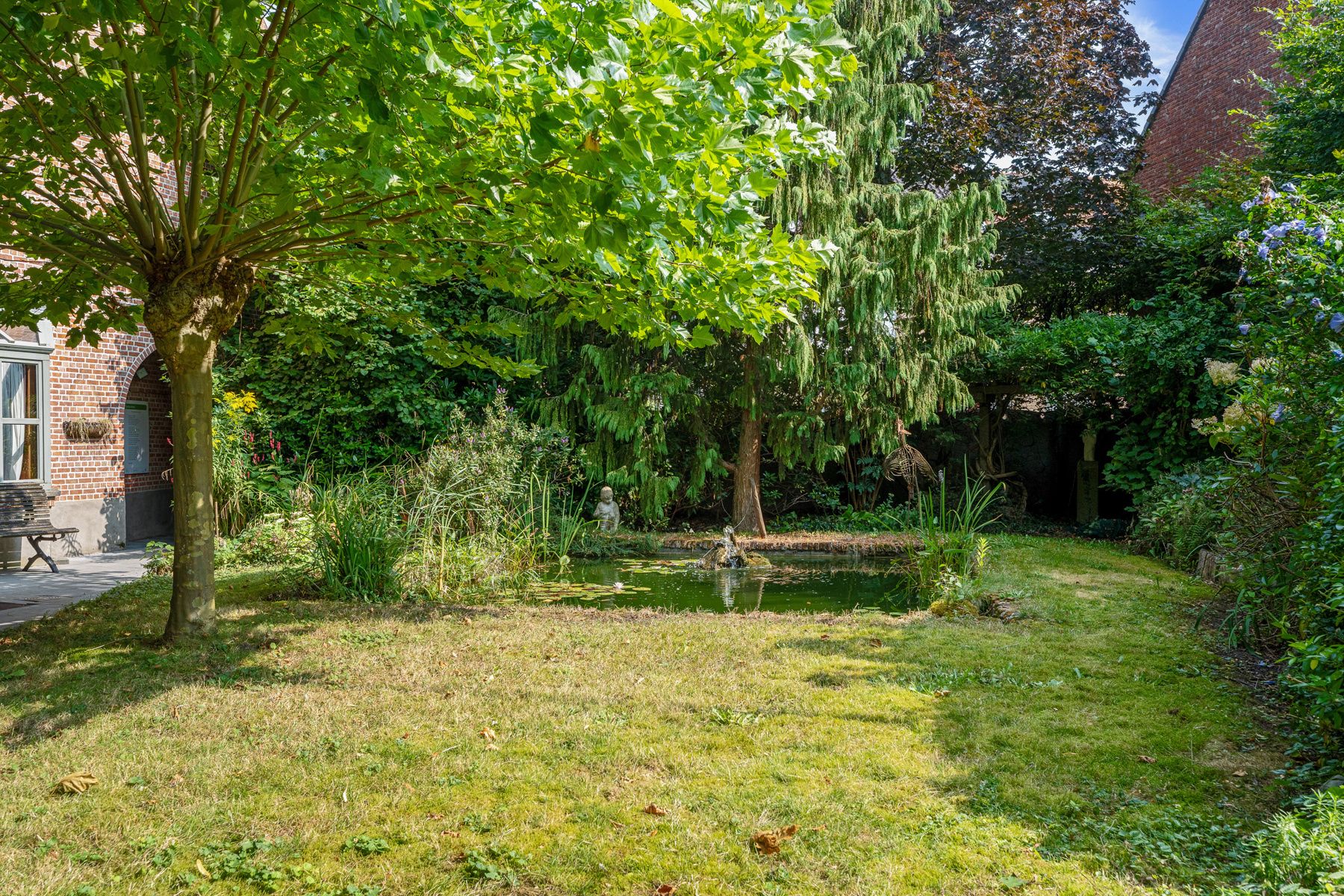 Karaktervolle woning met prachtige tuin in centrum Hamme foto 12