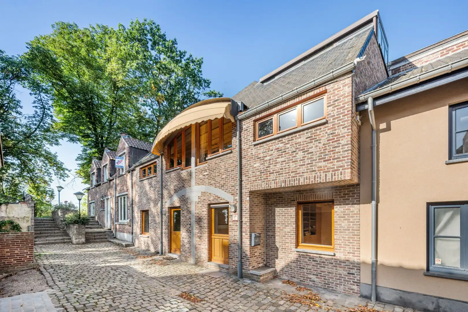 Ruime stadswoning in het centrum van Maaseik in een verkeersarme, doodlopende straat!  foto 4