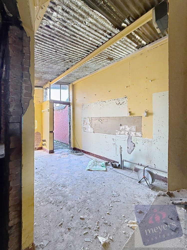 Te renoveren woning met goedgekeurde plannen in hartje Hasselt foto 9