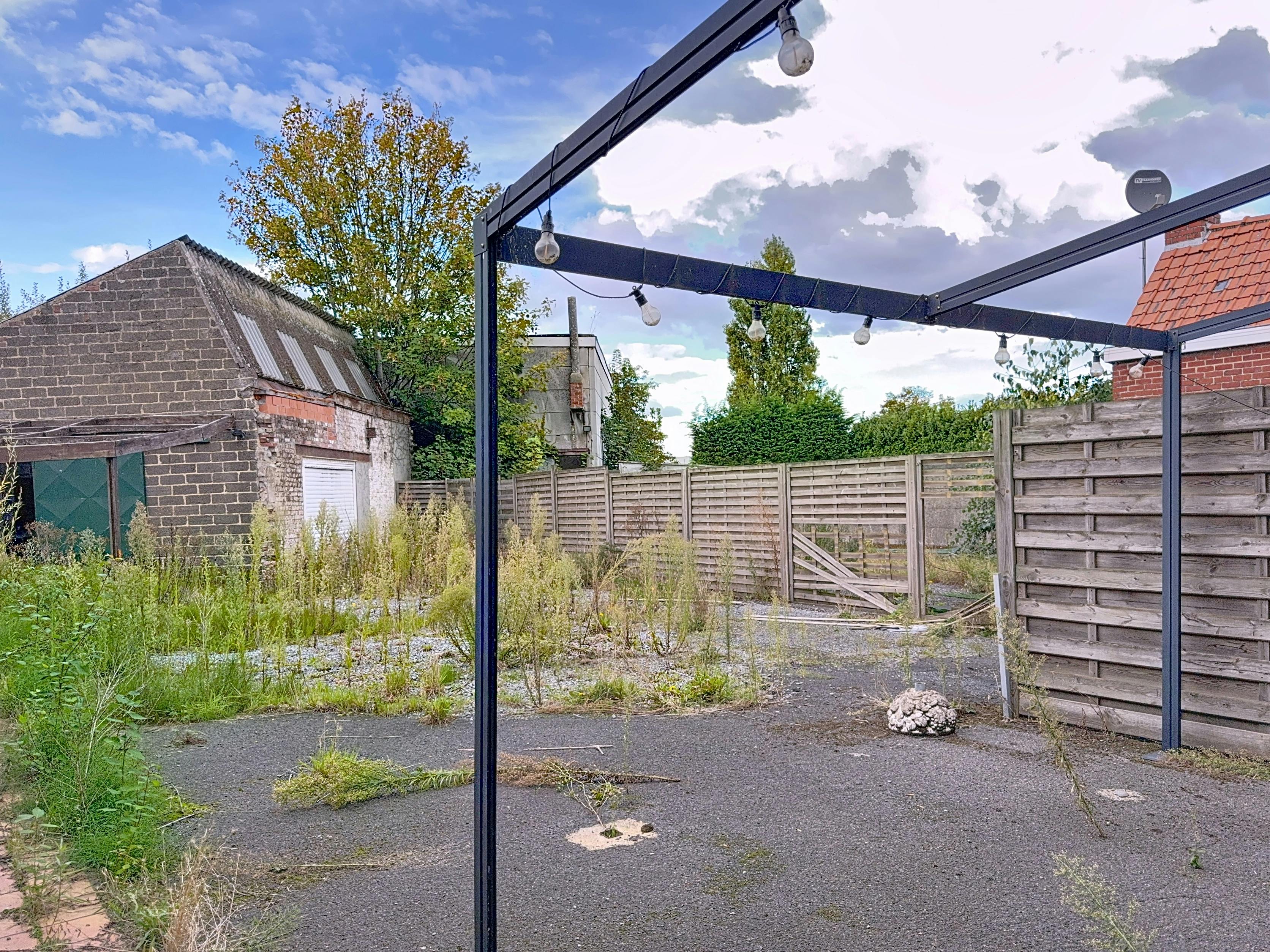 Te renoveren huis te koop in centrum Wielsbeke foto 7