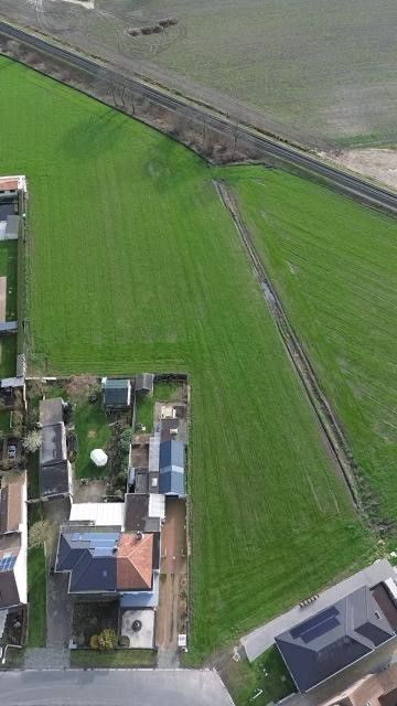 Zuid georiënteerd perceel bouwgrond centrum Evergem foto 1