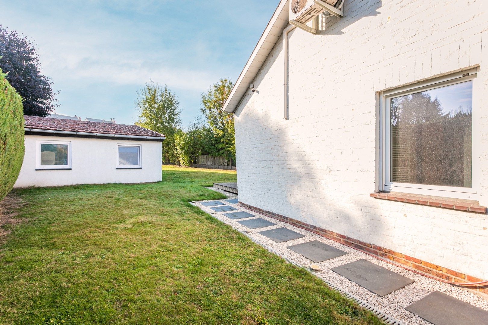Rustig gelegen halfopen woning met tuin en garage foto 24