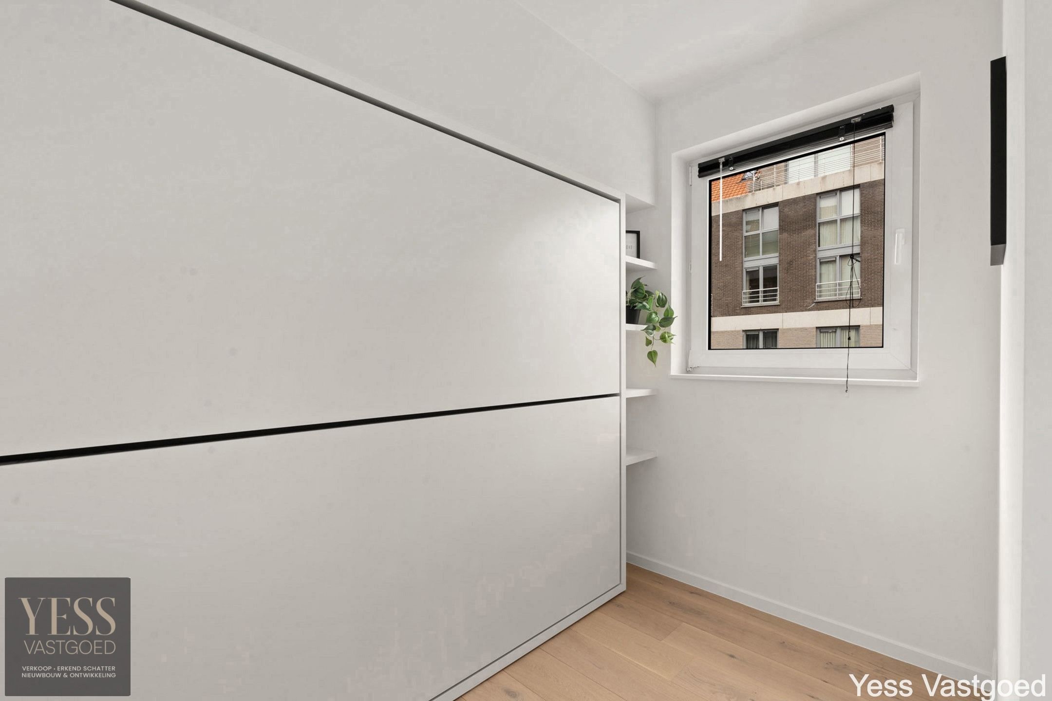 Prachtig gerenoveerd app met 2 slaapkamer centraal gelegen. foto 11