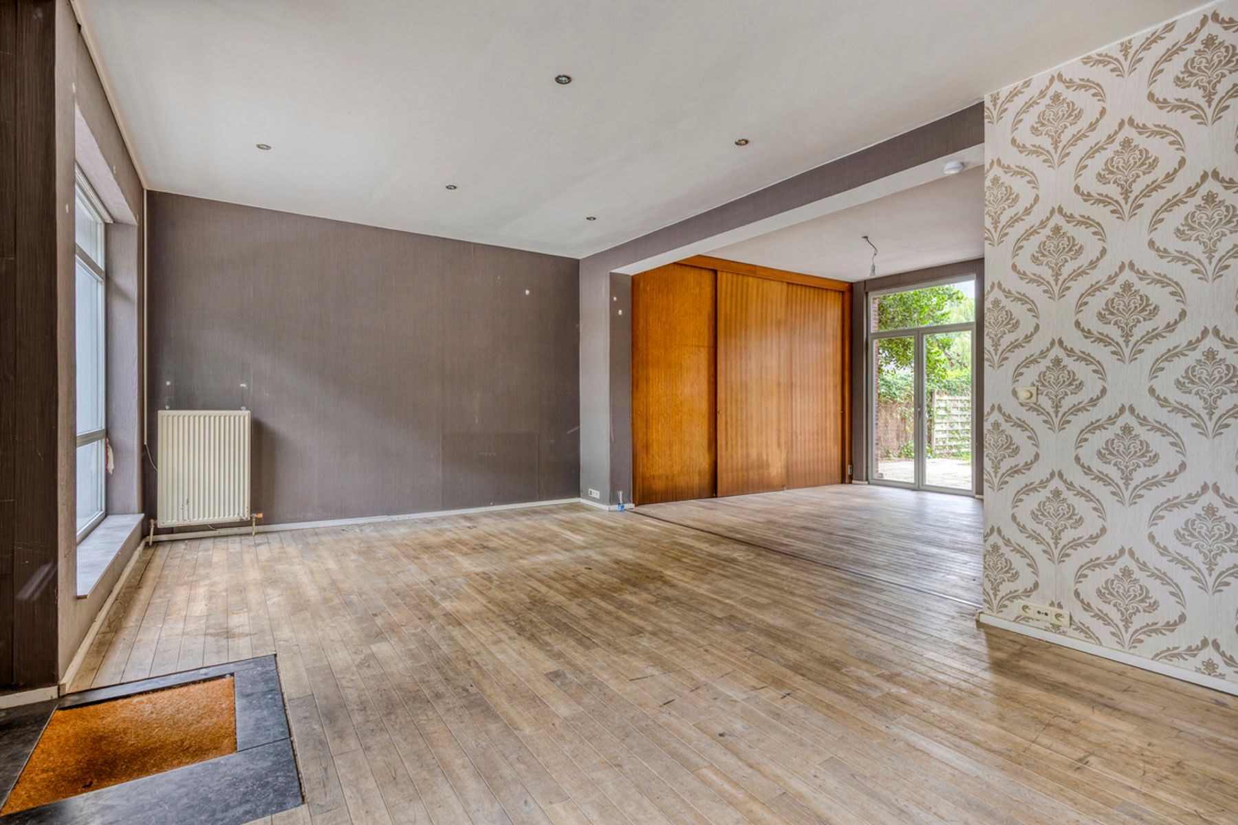 Ruim renovatieproject (226m²) met tuin aan kanaal foto 10