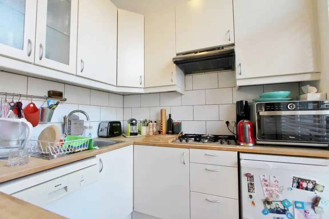 Gezellige triplex op toplocatie met 2 slaapkamers, terras en ondergrondse autostaanplaats foto 13