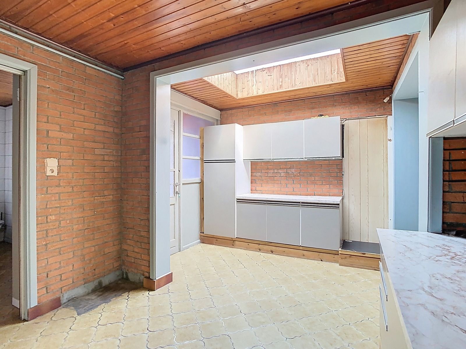 Mooie stadswoning met 2 SLPK,tuin en optionele garage! foto 7