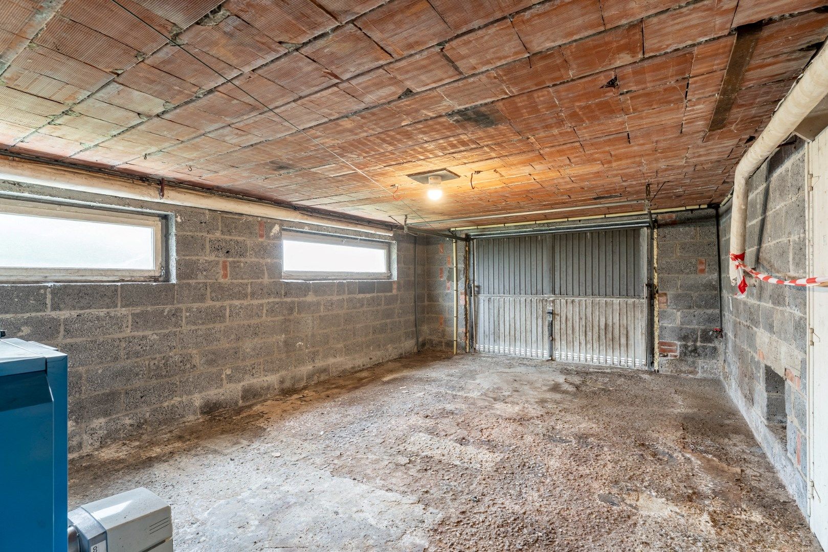 Te renoveren vrijstaande woning op een gunstig gelegen perceel van 12a 07ca vlakbij het centrum foto 16