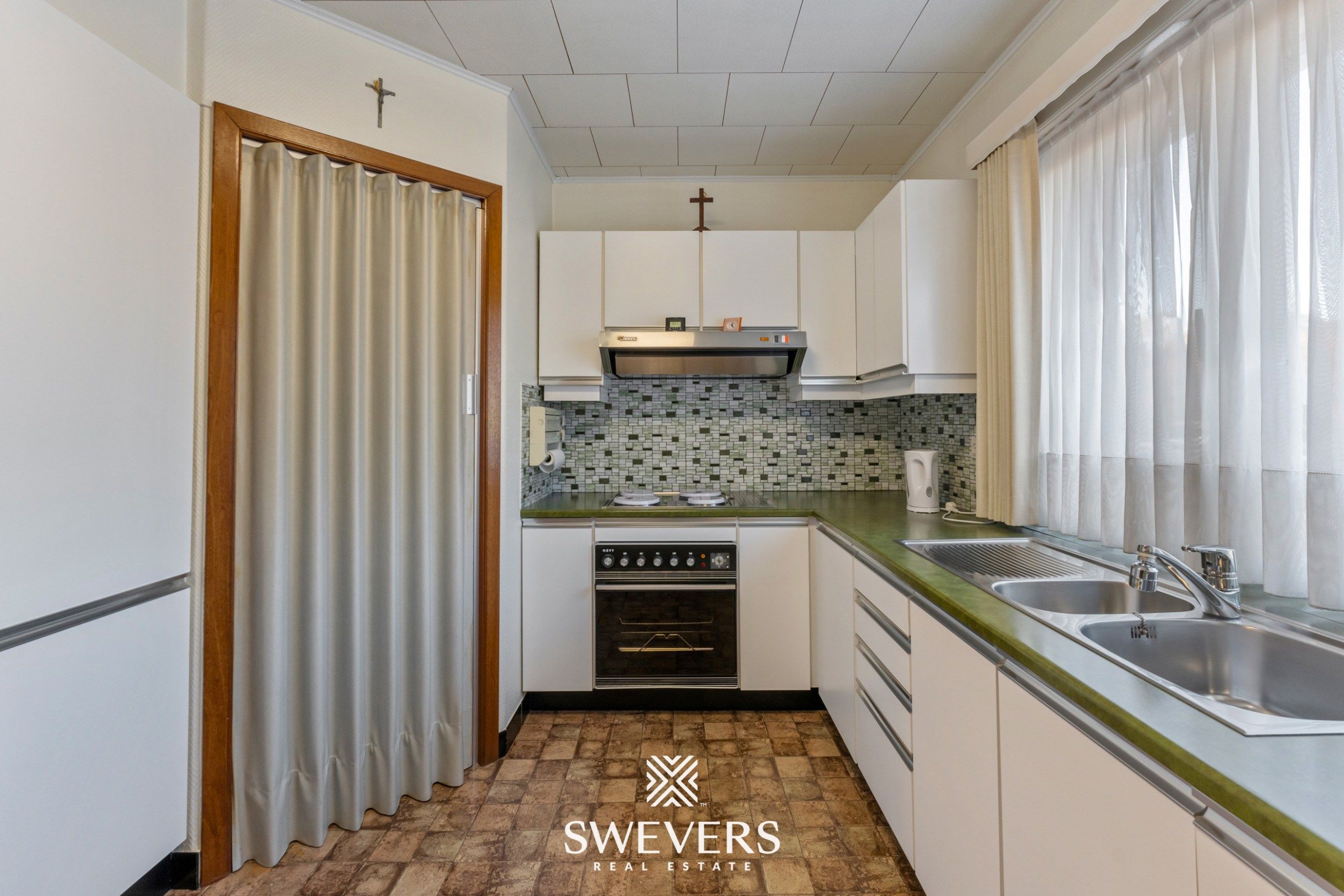 Verzorgd duplex-appartement, 1 slpk, met tuin en ruime garage  foto 14