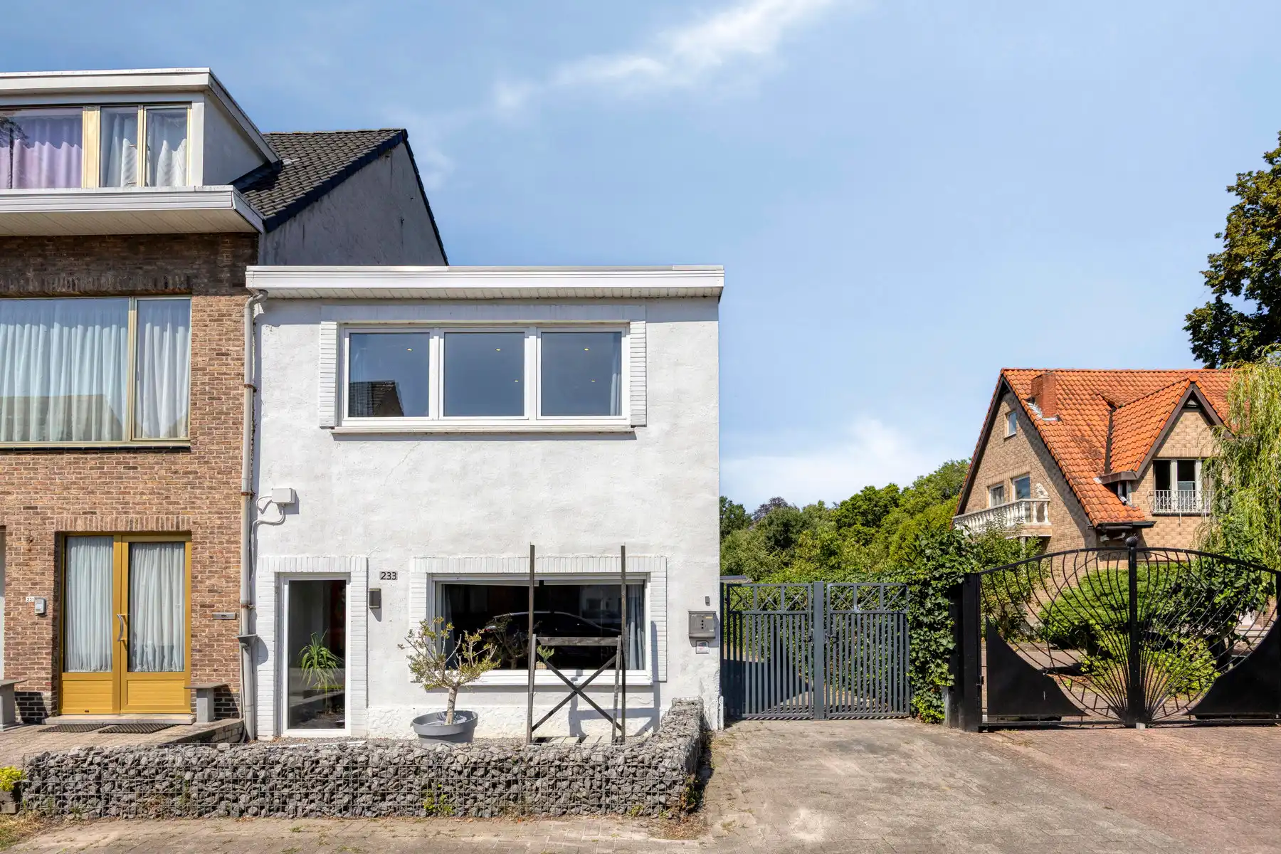 Veelzijdige halfopen bebouwing met woonstudio in de tuin foto 3