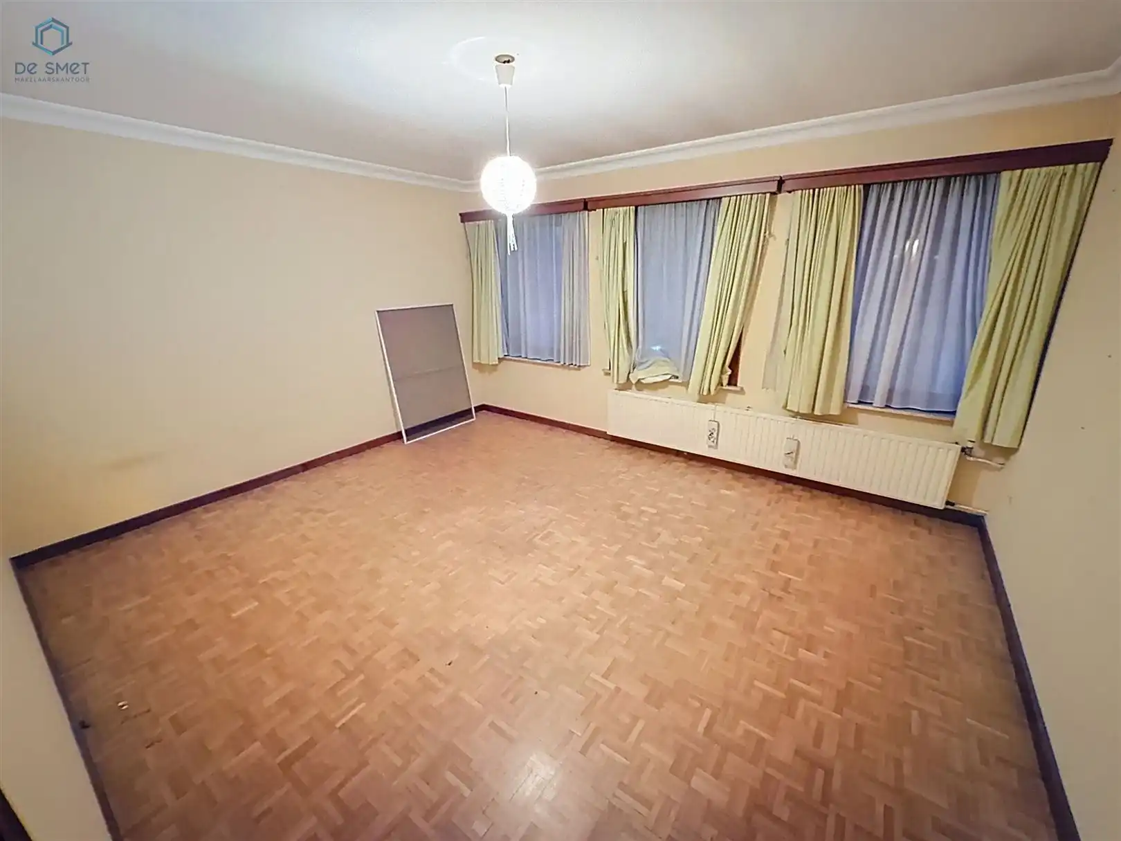 Te renoveren woning met 4 slaapkamers, garage en tuin op toplocatie in Denderleeuw foto 15