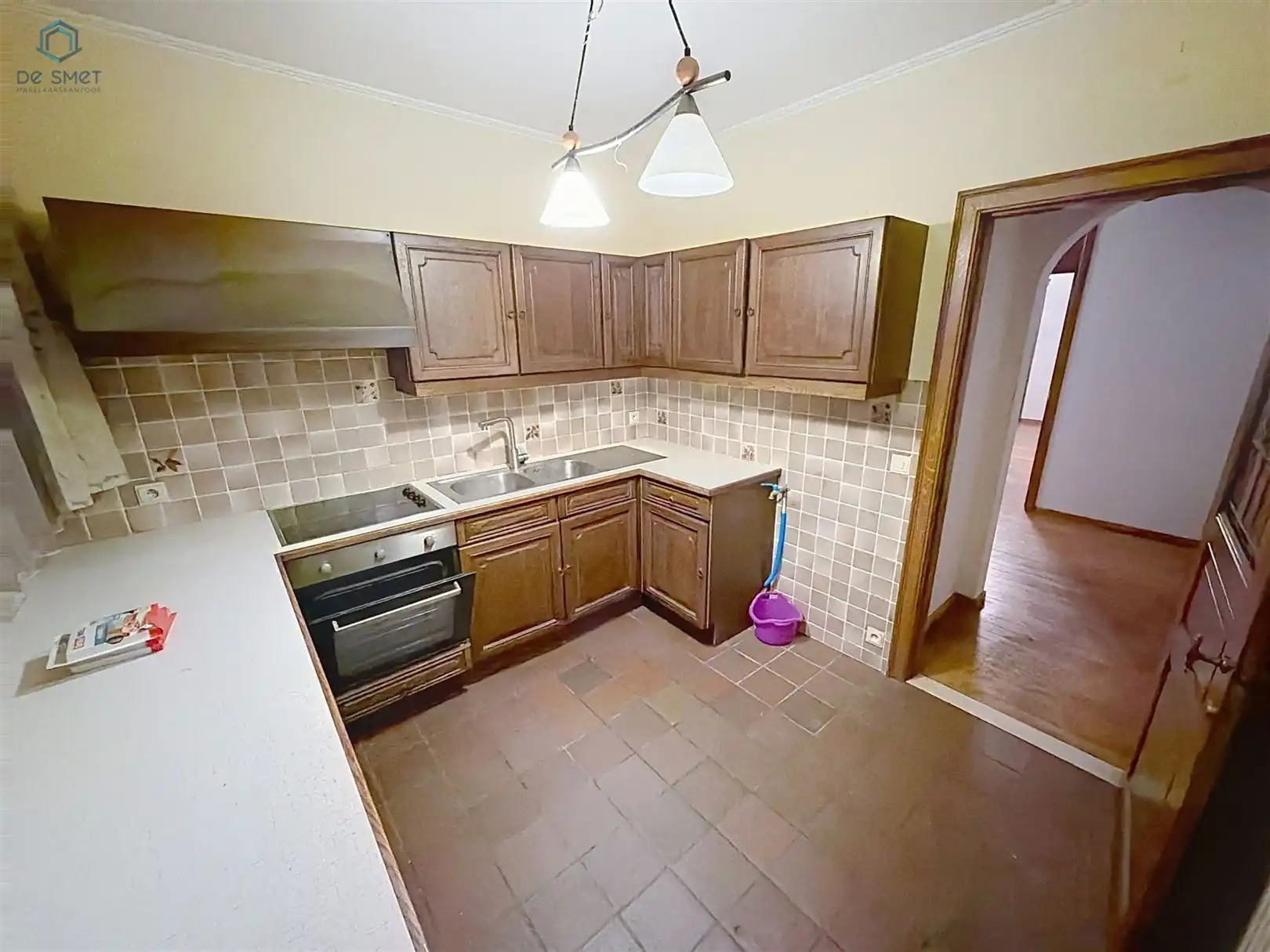 Te renoveren woning met 4 slaapkamers, garage en tuin op toplocatie in Denderleeuw foto 7