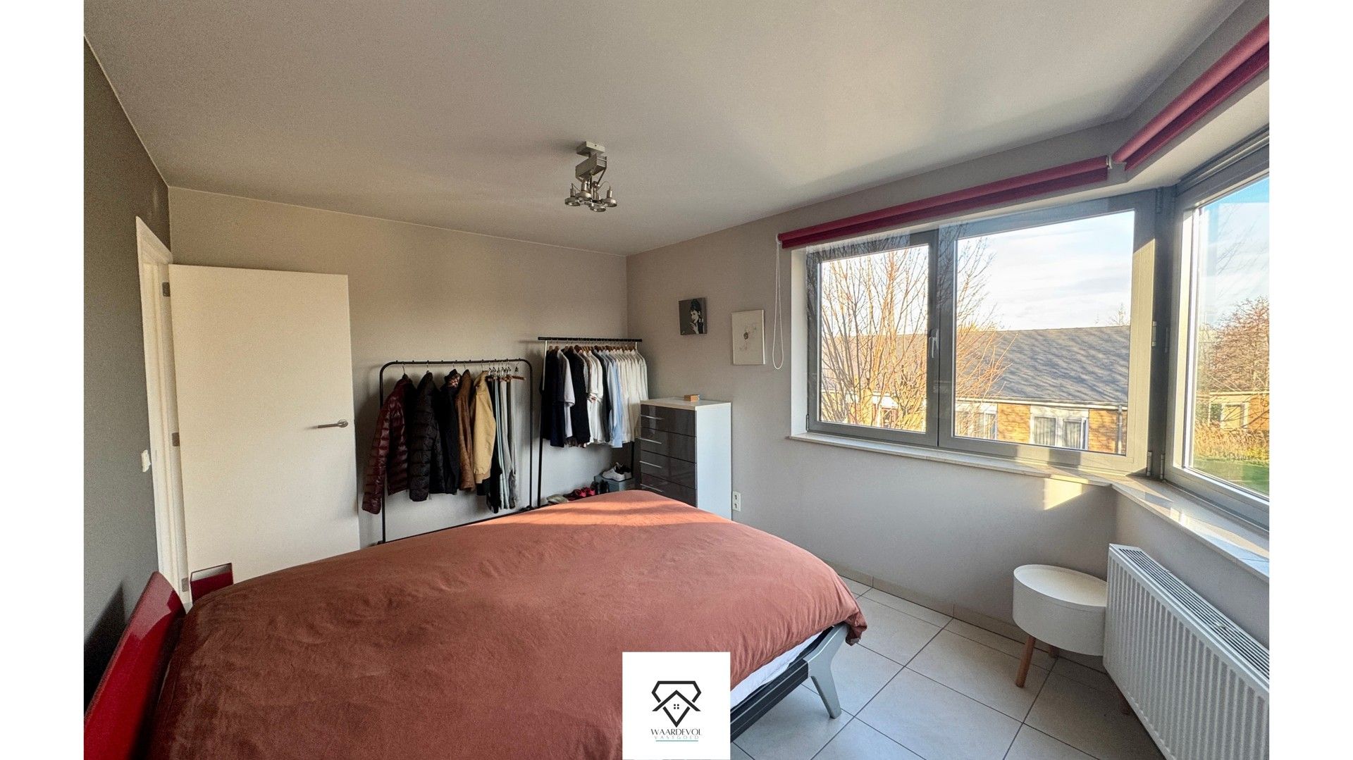 Lichtrijk en rustig appartement te koop met carport foto 11