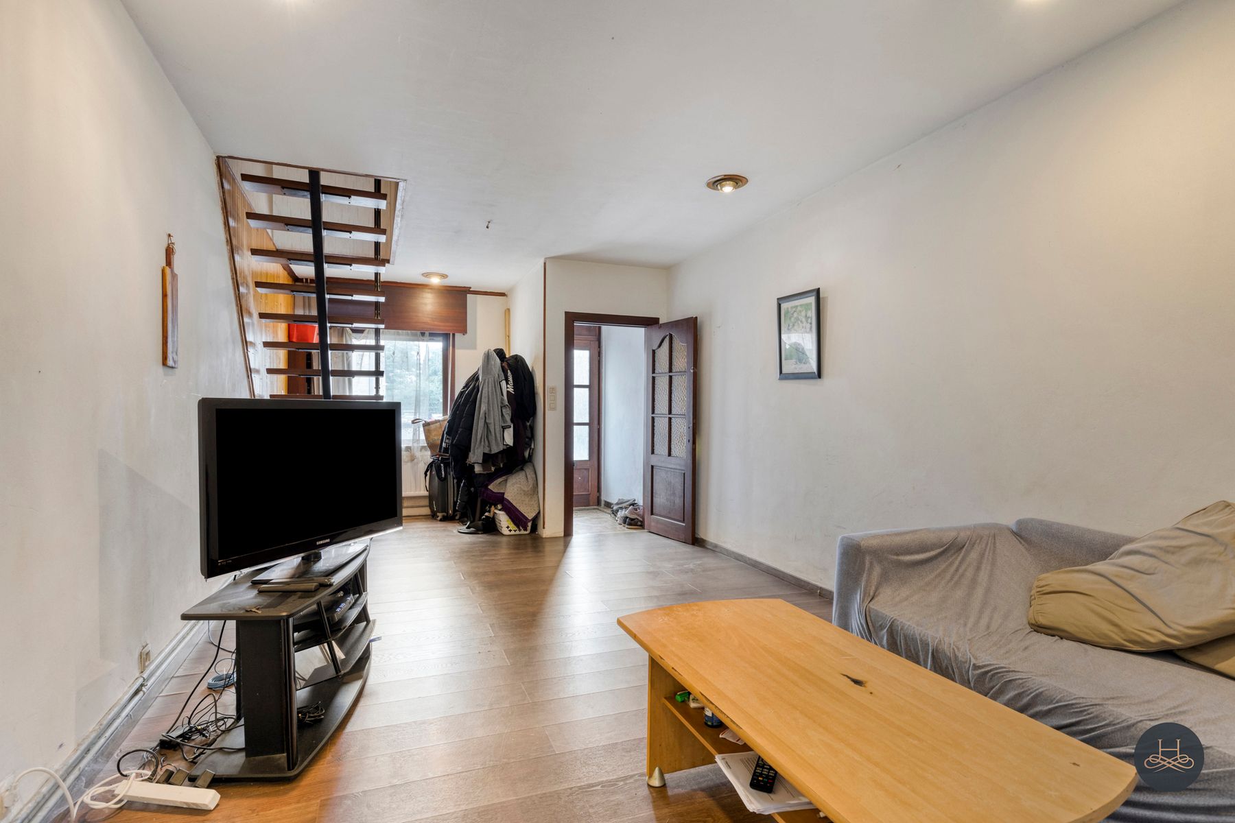 Gezellig centraal gelegen woning met potentieel foto 6