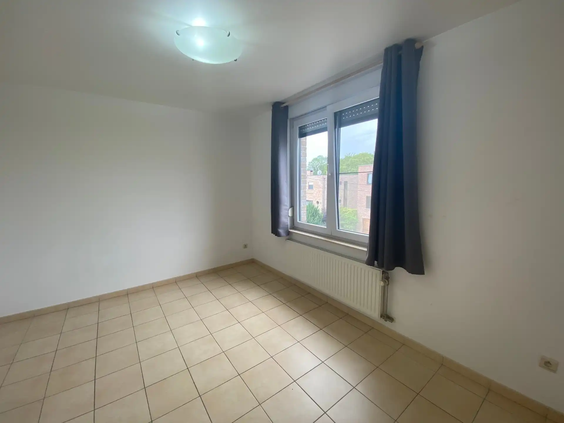Ruime en lichtrijke woning met aangename west-geörienteerde tuin, gelegen in een rustige en doodlopende straat op wandelafstand van het centrum van Kortenberg. foto 13