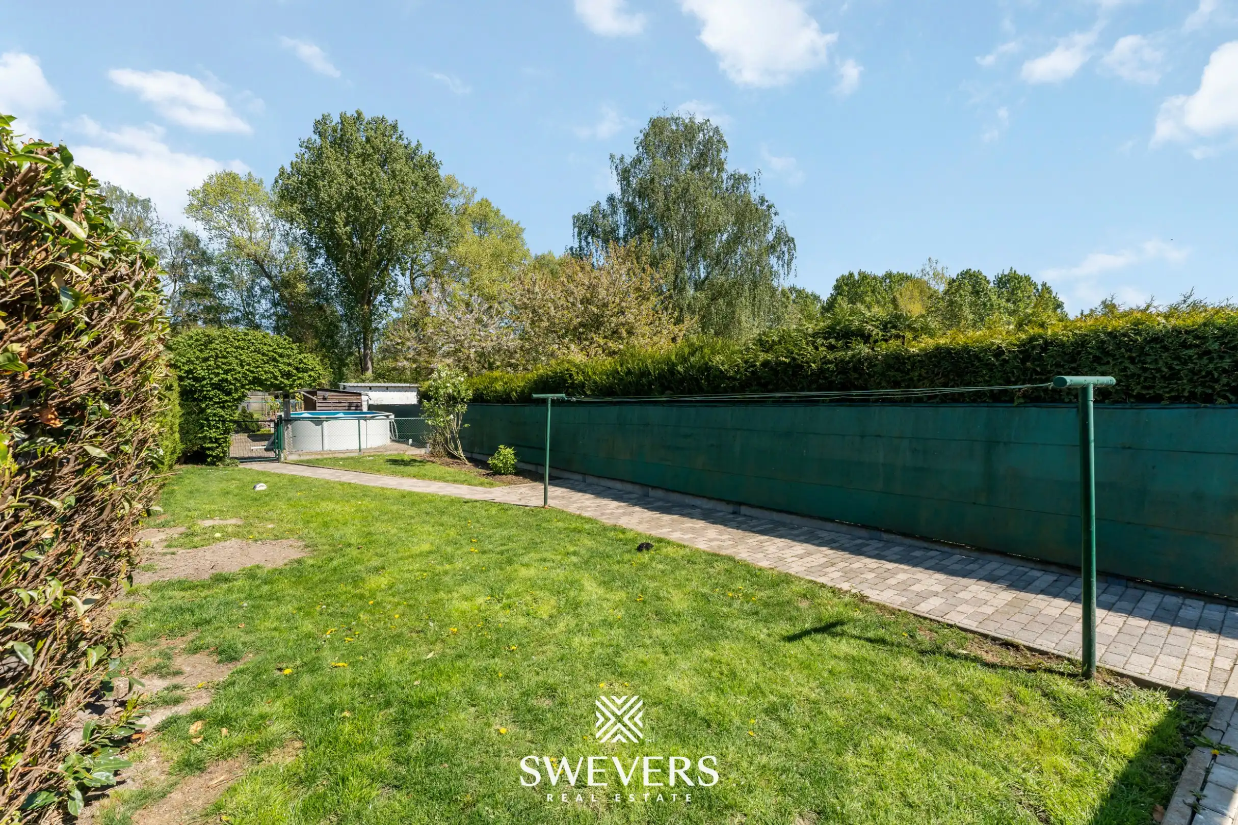 Instapklare, volledig gerenoveerde rijwoning met 3 slaapkamers en ruime tuin in Wellen foto 24