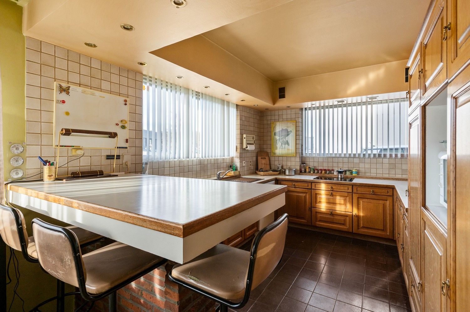 Karaktervolle halfopen woning met garage, oprit en gezellige tuin nabij het centrum van Borsbeek! foto 13