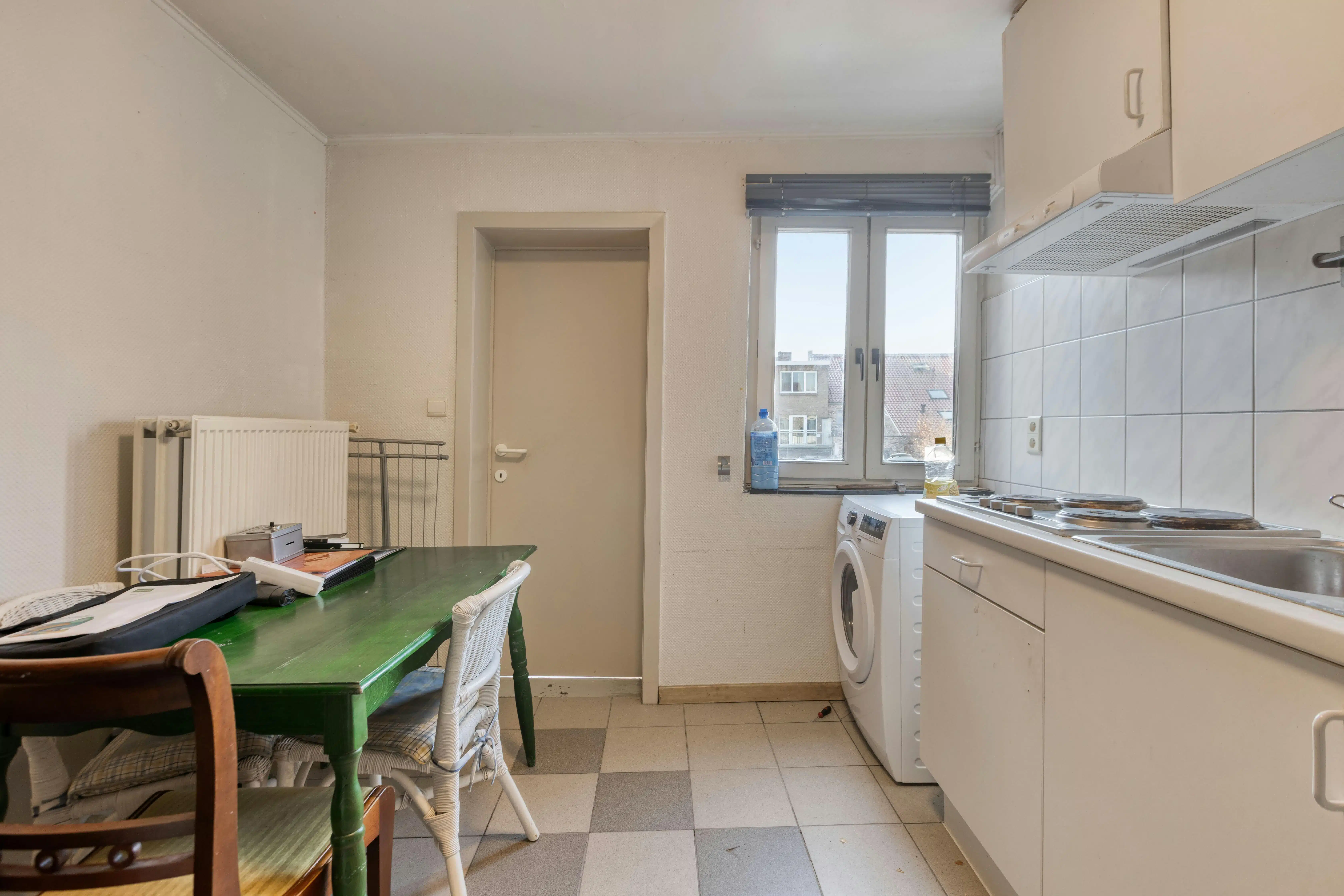 Op te frissen investeringspand met 2 appartementen in hartje Maaseik foto 10