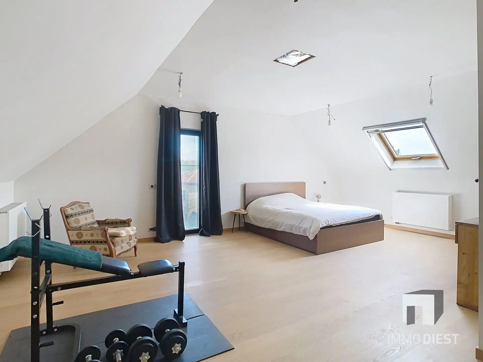 Moderne, lichtrijke woning met aangename tuin aan de voet van hartje Scherpenheuvel. foto 27