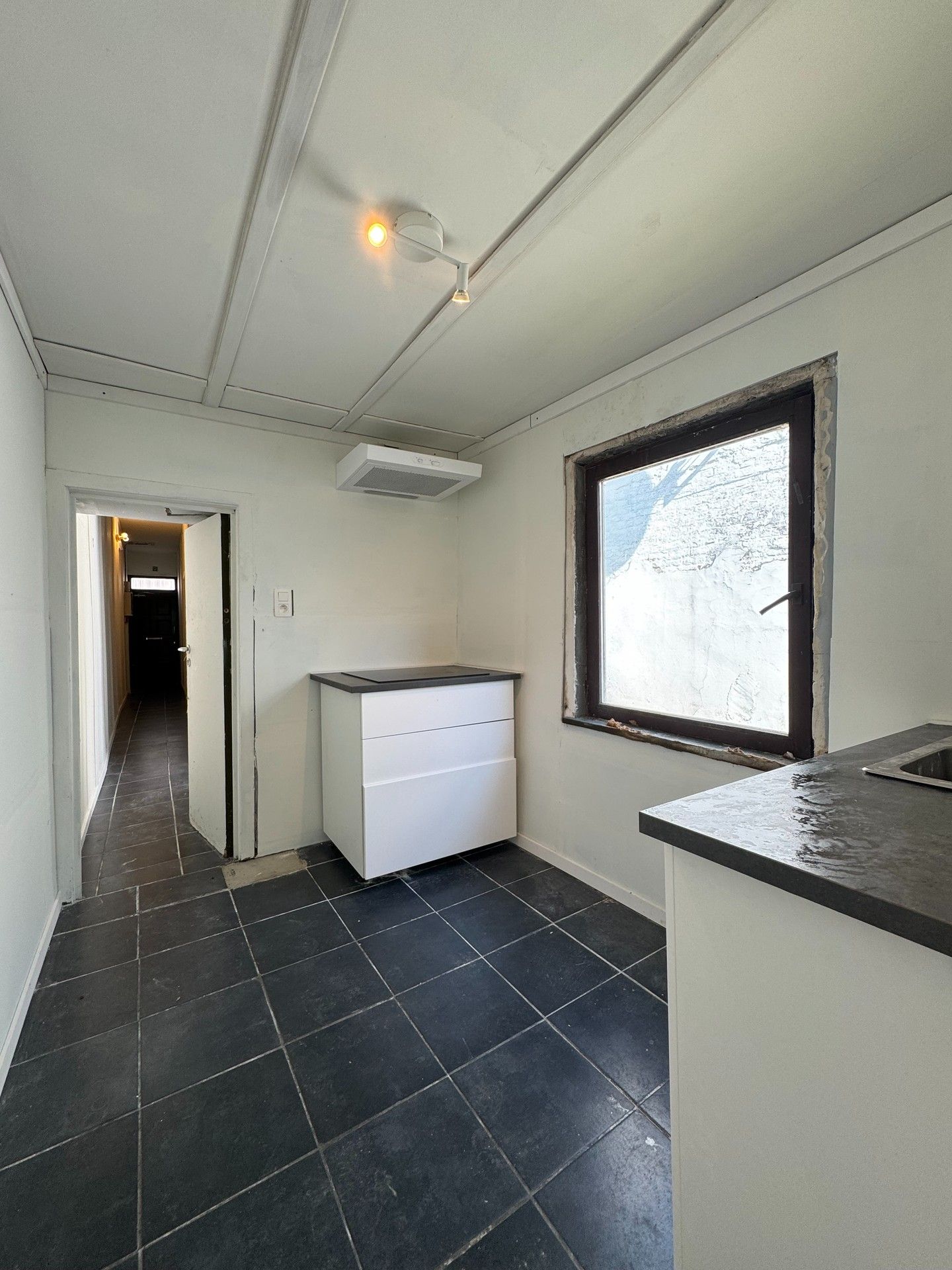 OPBRENGSTEIGENDOM MET 4 KAMERS EN 1 STUDIO foto 8