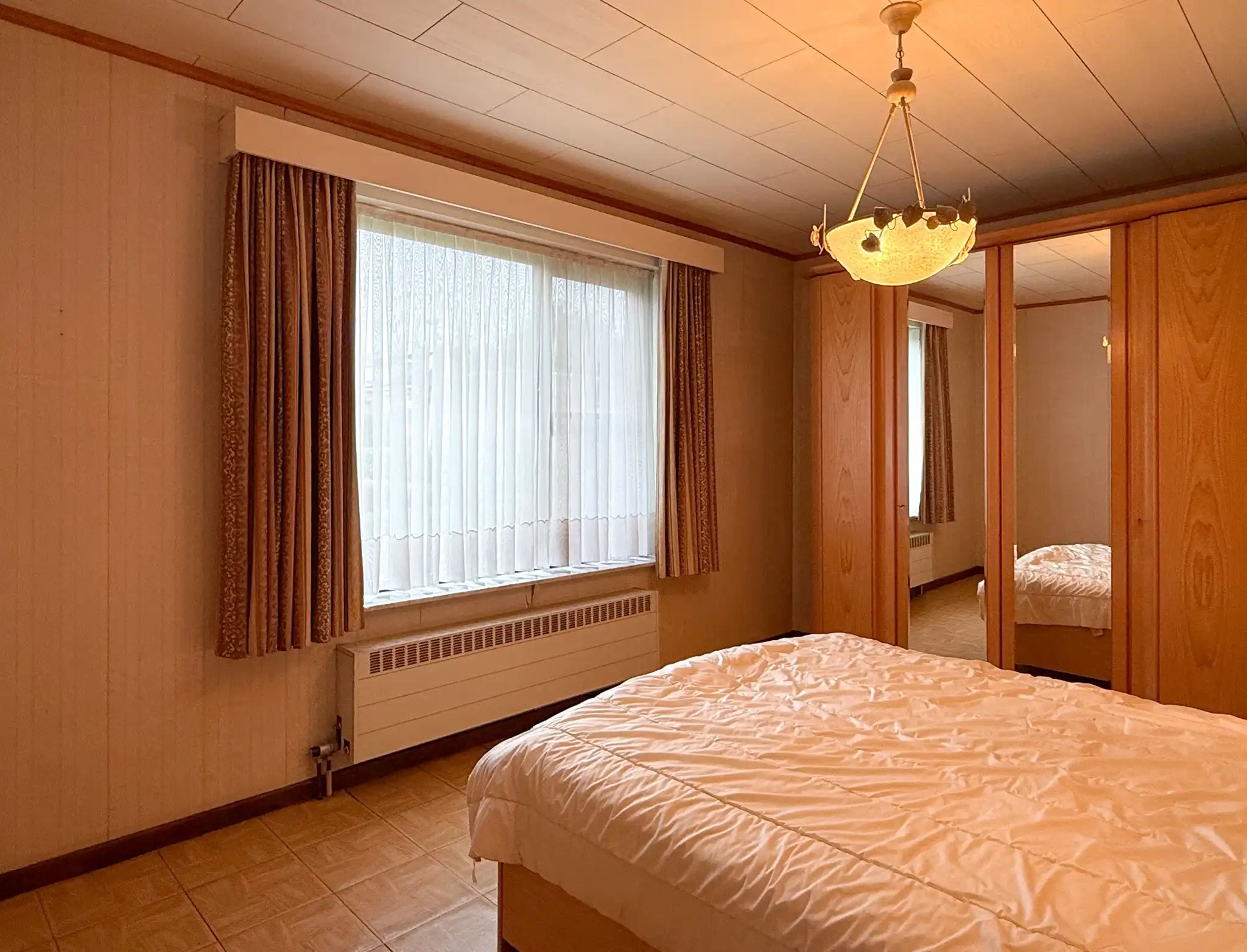 Ruim gelijkvloers appartement met tuin, garage en 3 kamers foto 12