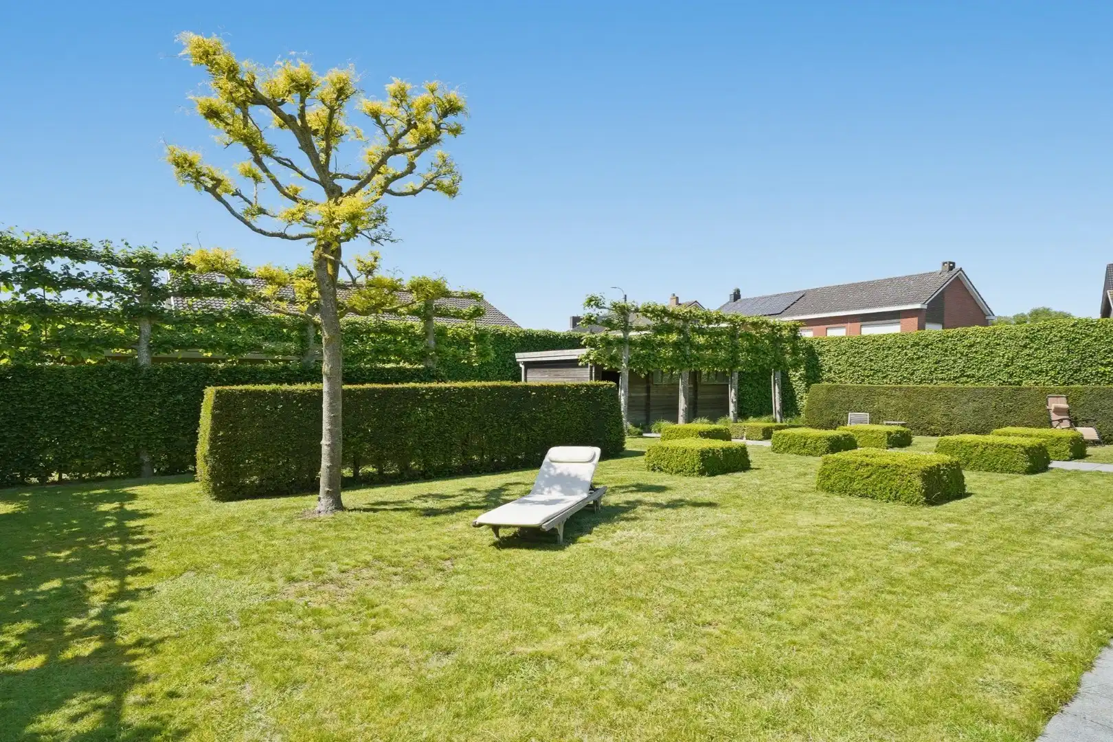 Alleenstaande woning met zonnige tuin op 980 m² foto 15